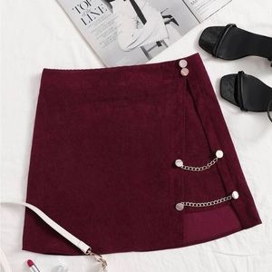 Chain detail corduroy skirt
